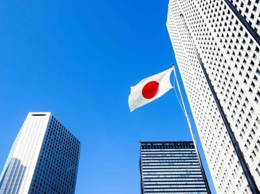 Prologis Timeline - 2001 The Japanese flag shown flying between skyscrapers
